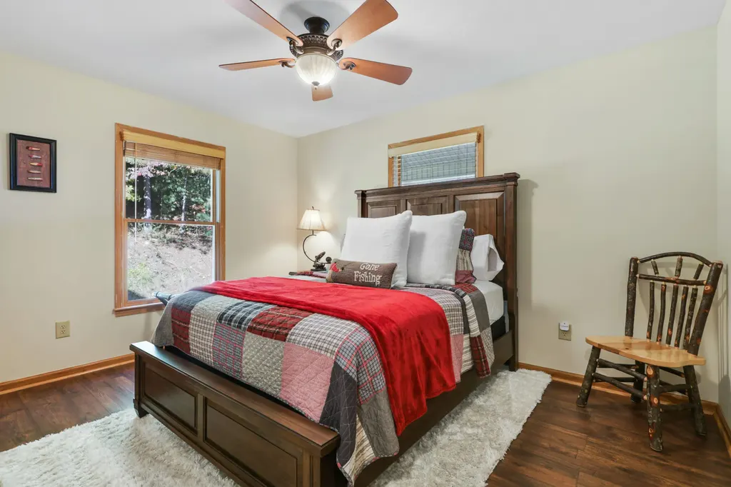 Cozy bedroom with red throw blanket