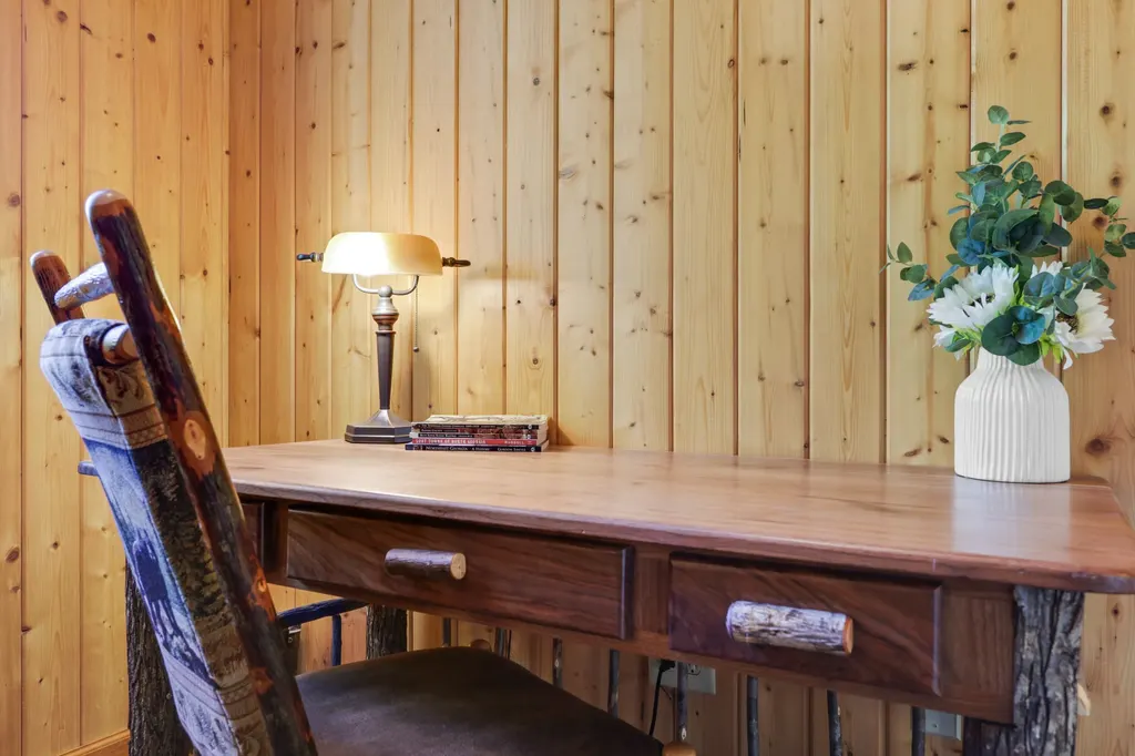 Desk and chair with mountain wall decor