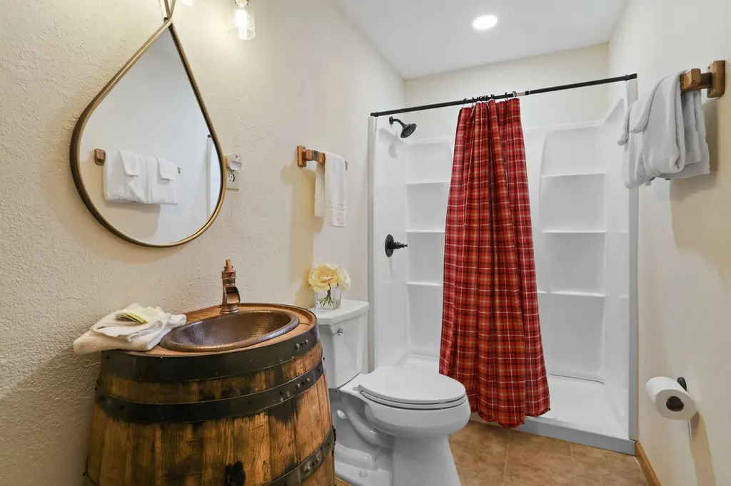 Half bath with rustic barrel sink