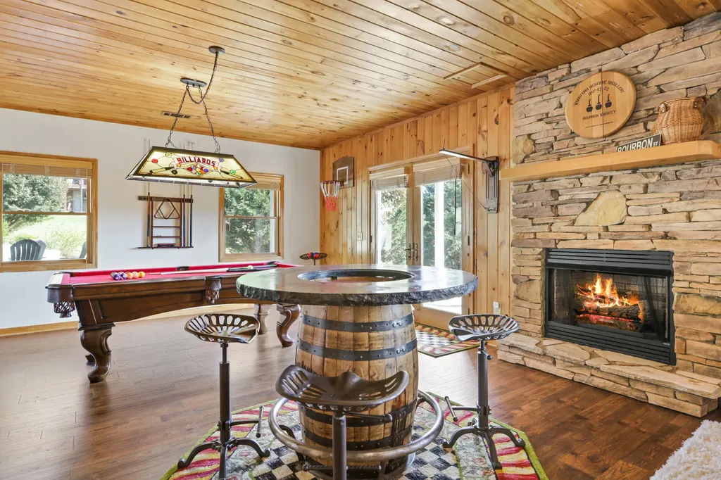 Recreation room barrel table and fireplace